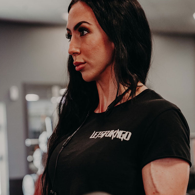 Woman working out in black shirt